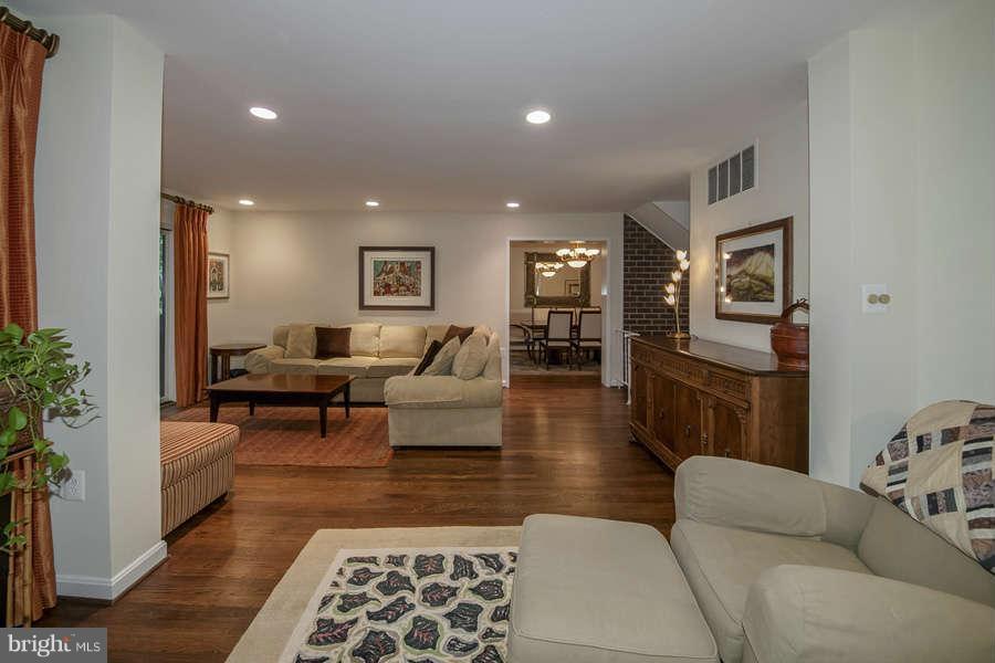 7906 Inverness Ridge Road Potomac, MD 20854 - Photo 9 of 30 a living room with furniture and a couch