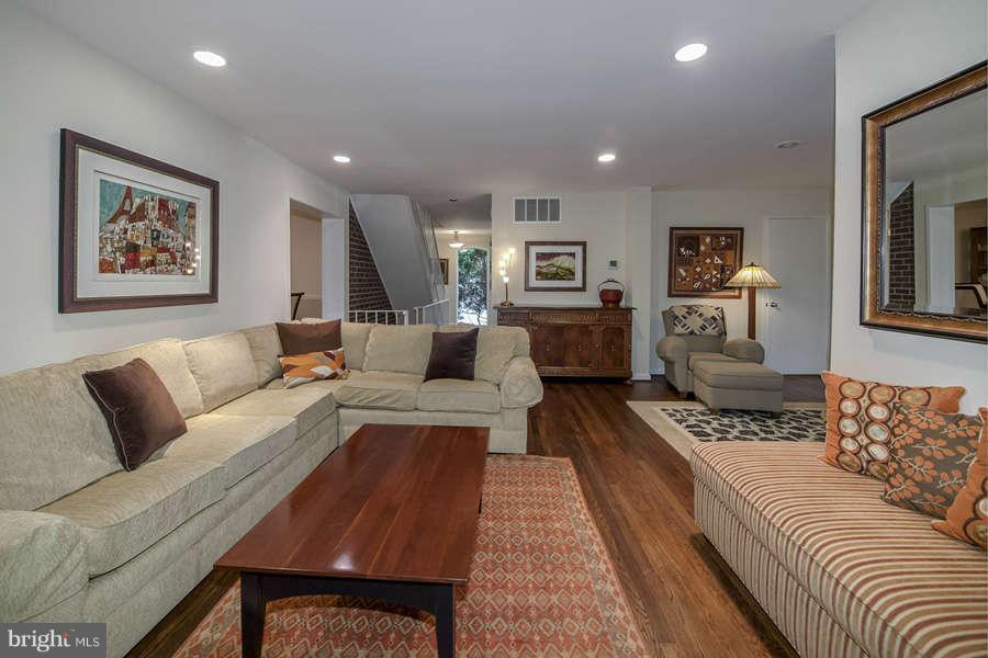 7906 Inverness Ridge Road Potomac, MD 20854 - Photo 10 of 30 a living room with furniture and a couch