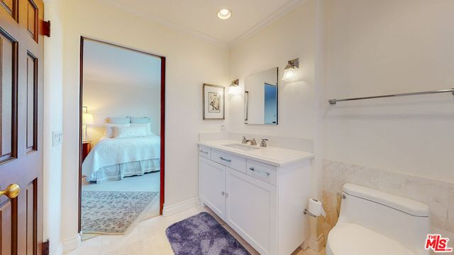 a bed room with a bed and a couch