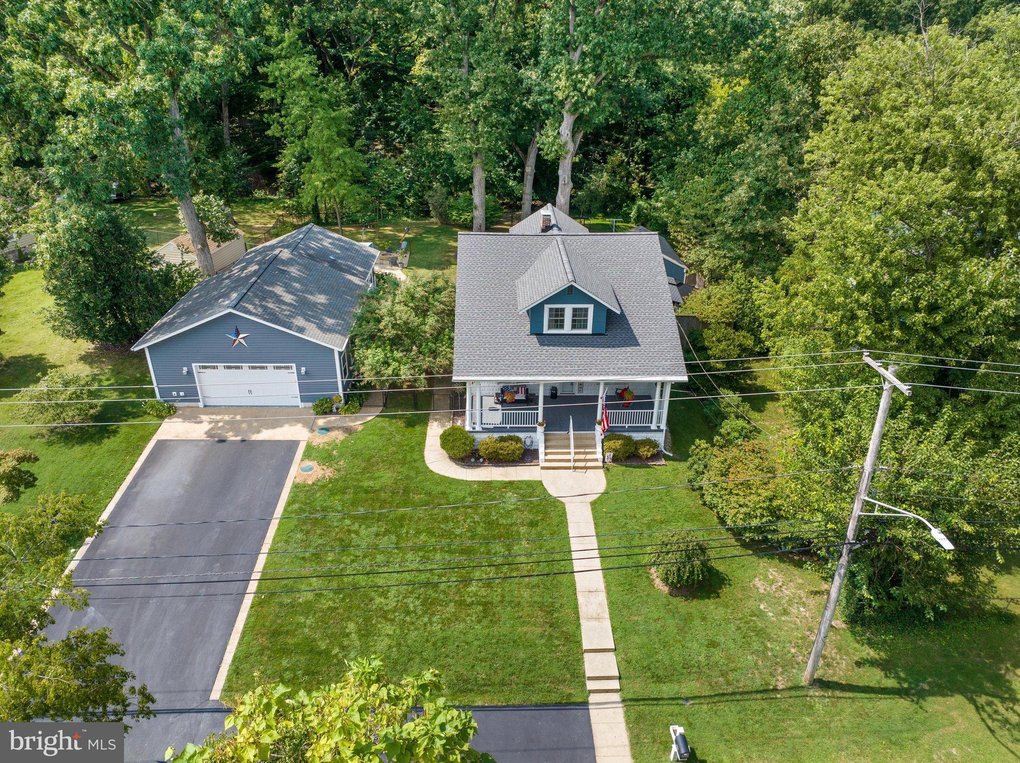 522 Old Hammonds Ferry Road Linthicum Heights, MD 21090 - Photo 60 of 109 Charming home nestled among lush greenery.