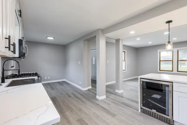 a kitchen with a stove and a sink