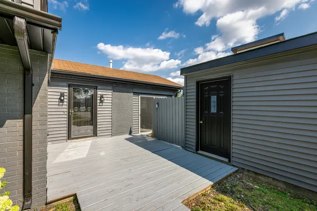 a view of backyard with cabin