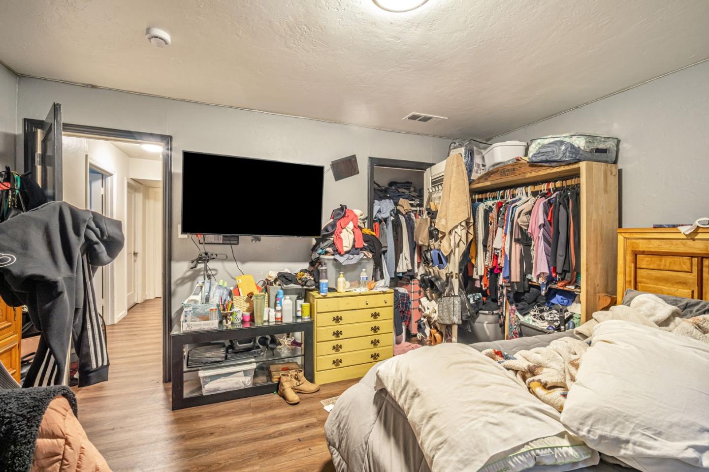 838 Wheeler Street Santa Rosa, CA 95404 - Photo 20 of 45 a bedroom with bed a flat tv screen and dresser