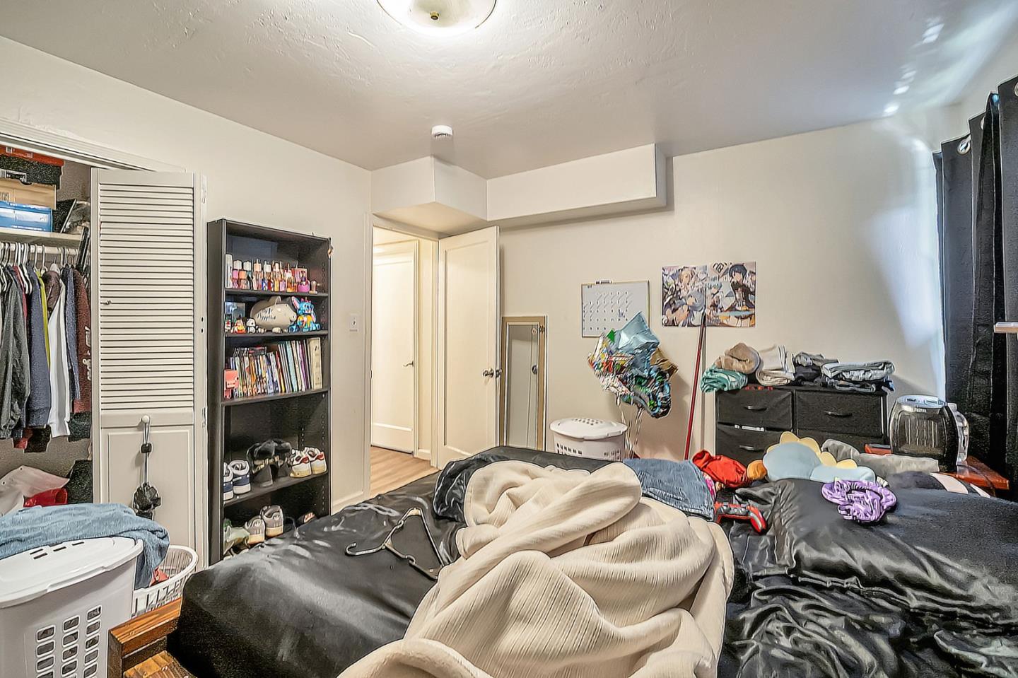838 Wheeler Street Santa Rosa, CA 95404 - Photo 21 of 45 a bedroom with a bed and a window
