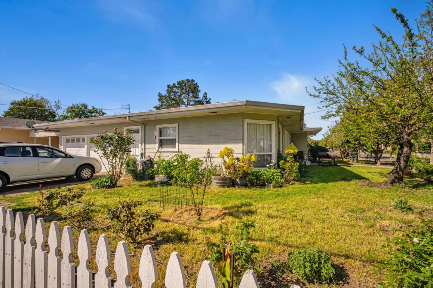 838 Wheeler Street Santa Rosa, CA 95404 - Photo 3 of 45 a front view of house with yard seating and green space