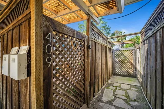 a view of a house with a street