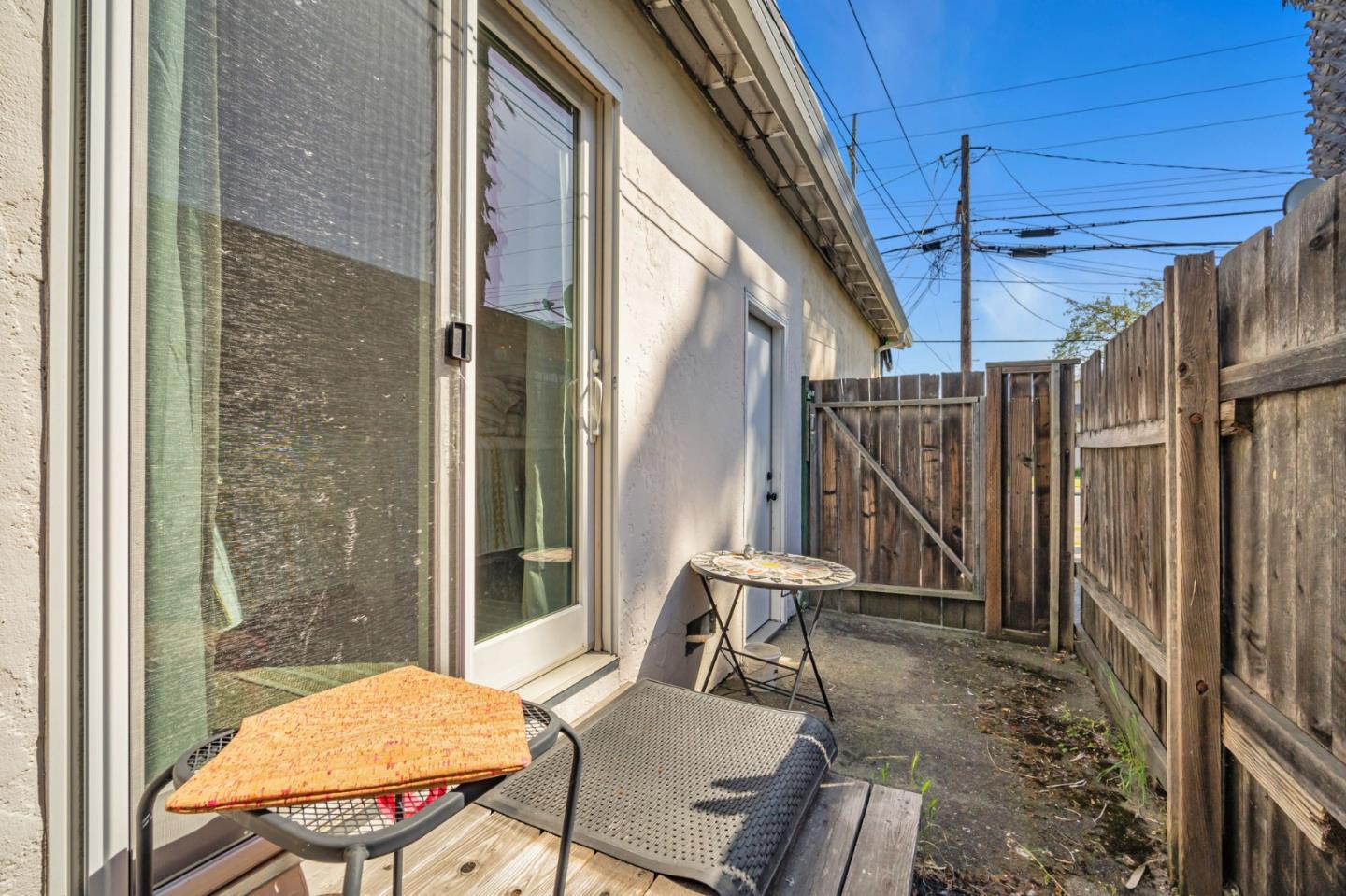 838 Wheeler Street Santa Rosa, CA 95404 - Photo 42 of 45 a view of a patio with a table and chairs