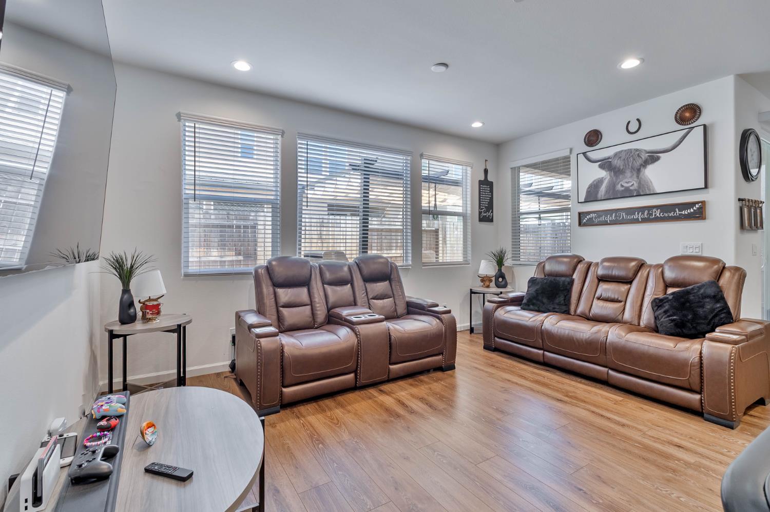 915 Winchell Way West Madera, CA 93636 - Photo 14 of 36 a living room with furniture window and wooden floor