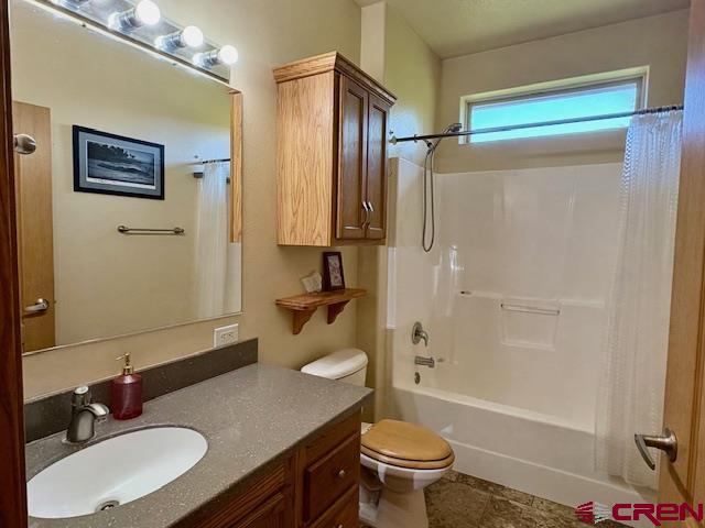 12299 Rd G Cortez, CO 81321 - Photo 18 of 44 a bathroom with a sink a toilet and shower