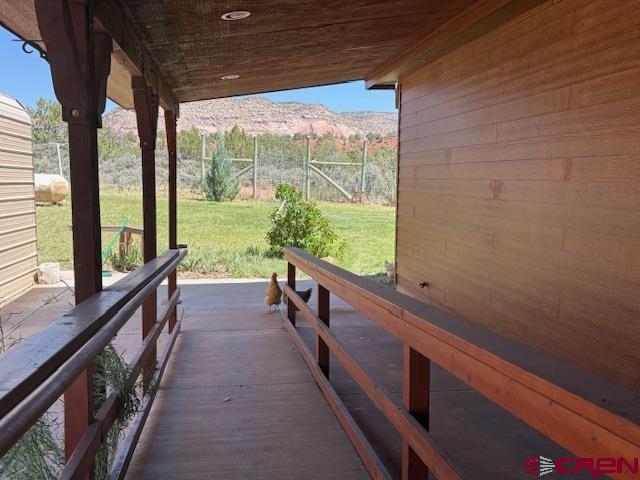 12299 Rd G Cortez, CO 81321 - Photo 22 of 44 a view of a porch and wooden floor