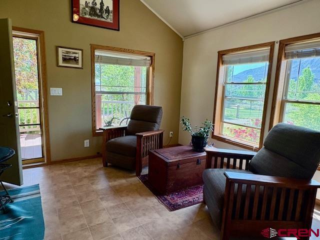 12299 Rd G Cortez, CO 81321 - Photo 28 of 44 a living room with furniture and a window