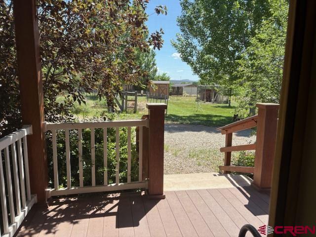 12299 Rd G Cortez, CO 81321 - Photo 30 of 44 a view of a house with backyard and deck