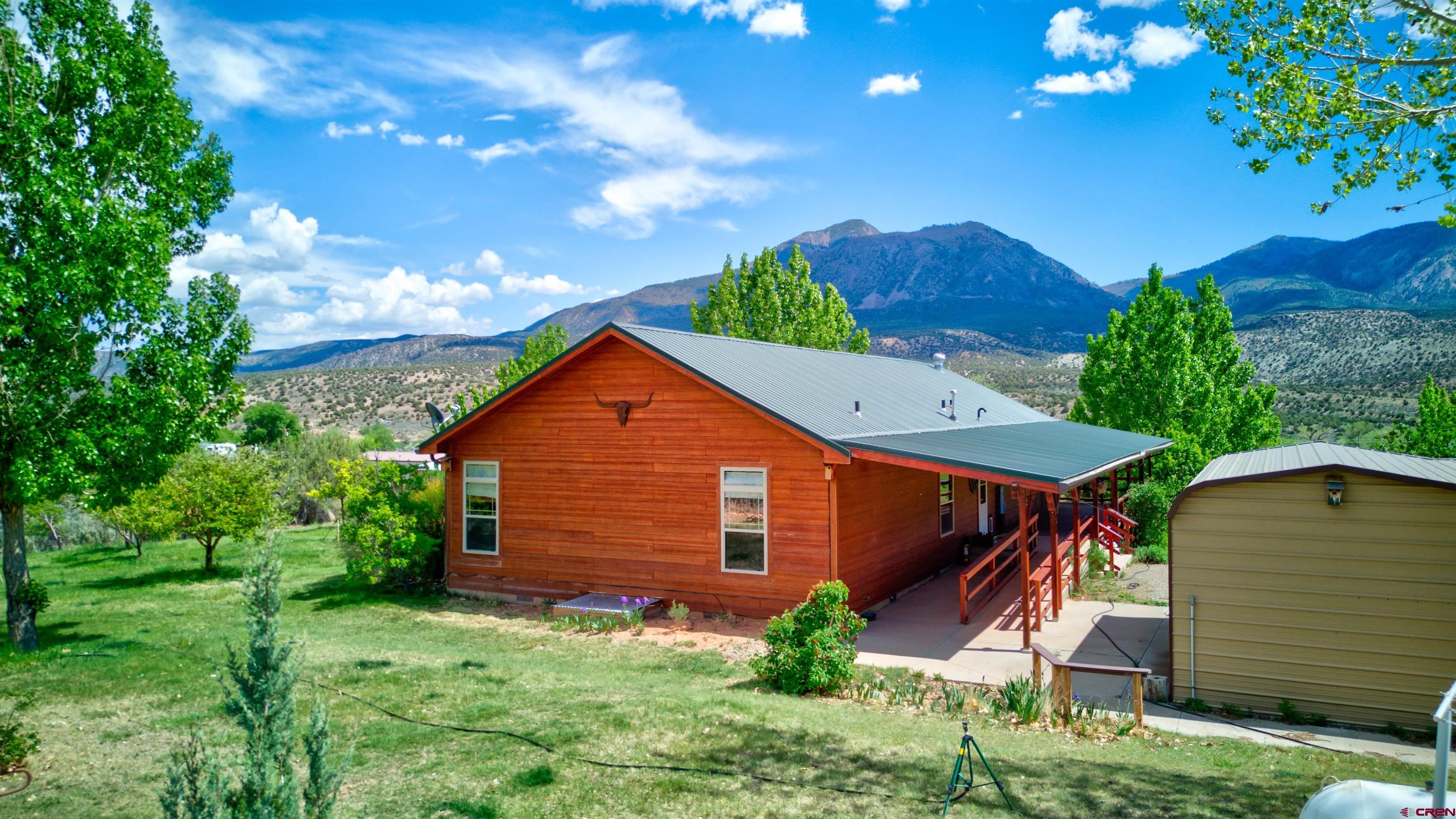 12299 Rd G Cortez, CO 81321 - Photo 5 of 44 a view of a house with a yard