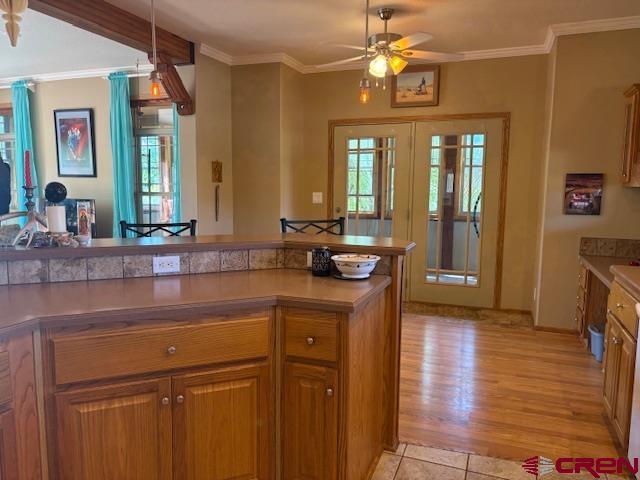 12299 Rd G Cortez, CO 81321 - Photo 9 of 44 a kitchen with a sink cabinets and wooden floor