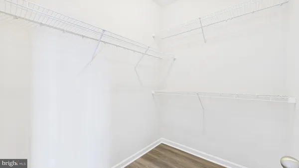 a view of a room with racks on the wall