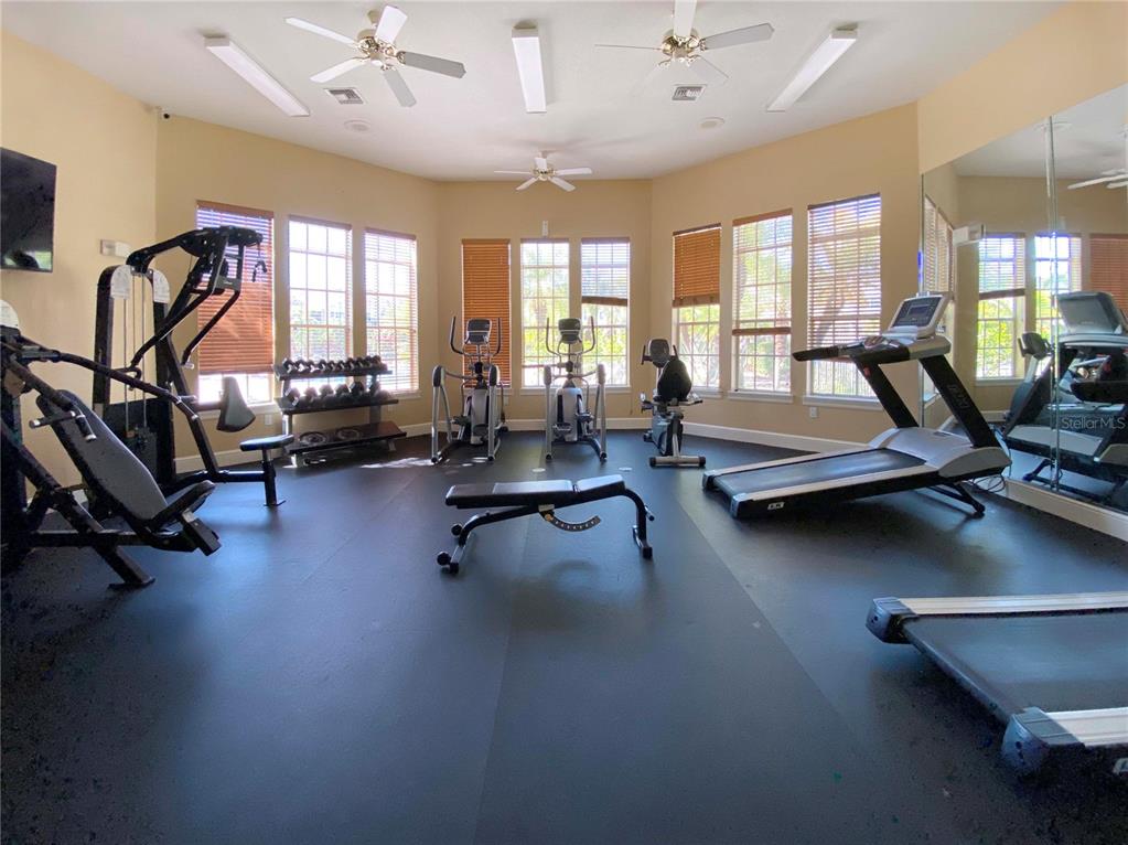 8926 Manor Loop, Unit 107 Lakewood Ranch, FL 34202 - Photo 38 of 44 a view of a room with gym equipment