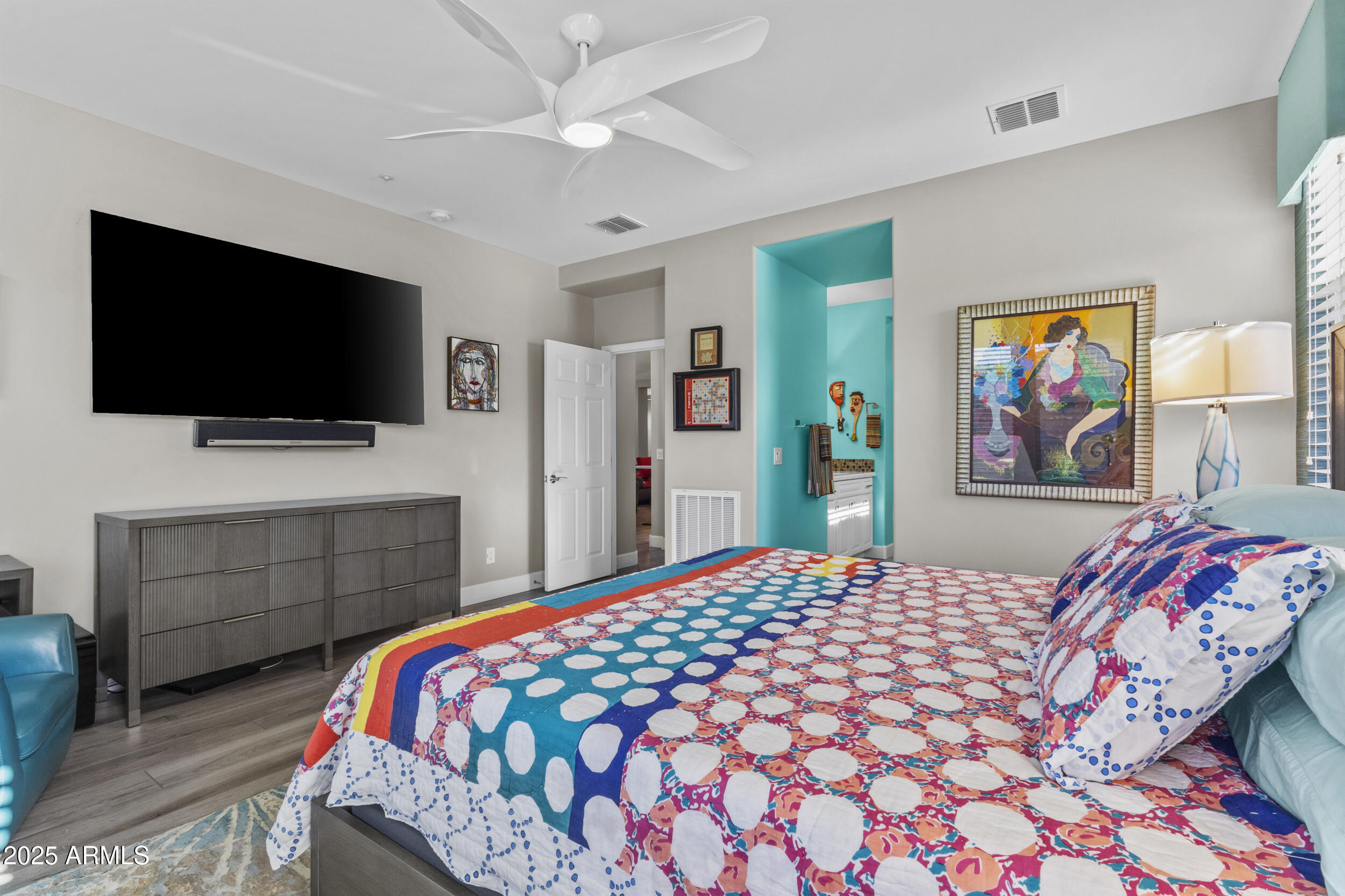 18068 East Curva De Plata Rio Verde, AZ 85263 - Photo 15 of 71 a bedroom with a bed and a flat screen tv in it