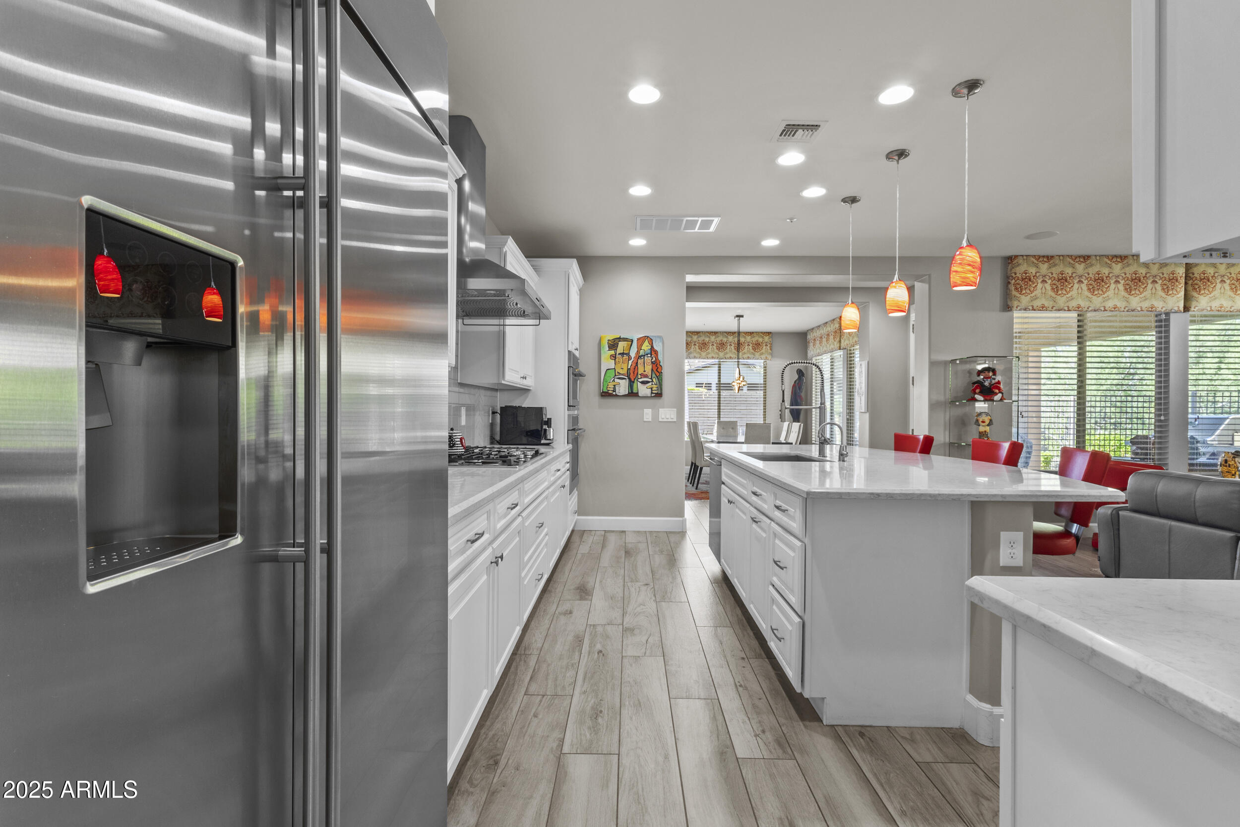 18068 East Curva De Plata Rio Verde, AZ 85263 - Photo 22 of 71 a kitchen with counter top space and stainless steel appliances