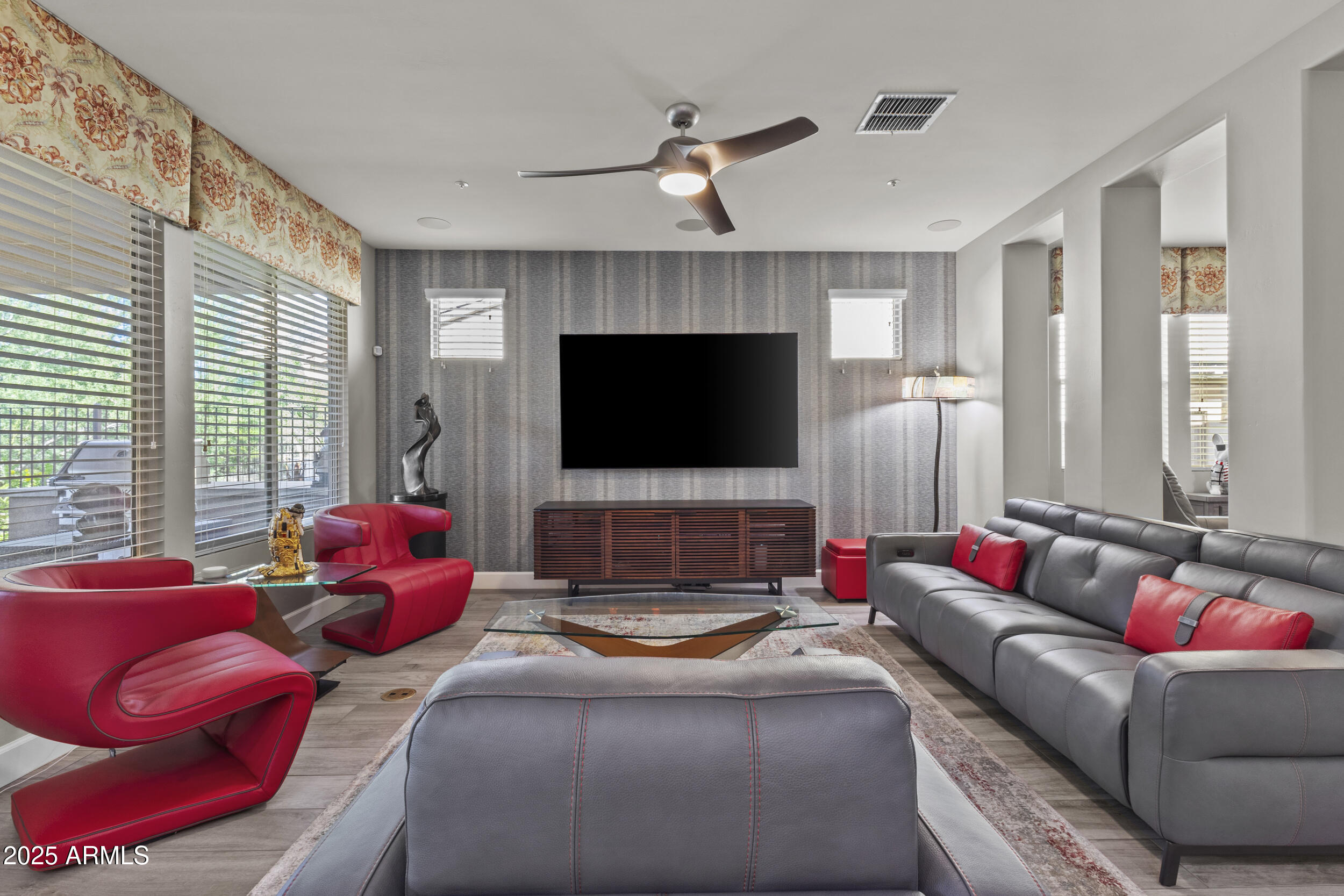 18068 East Curva De Plata Rio Verde, AZ 85263 - Photo 25 of 71 a living room with furniture and a flat screen tv