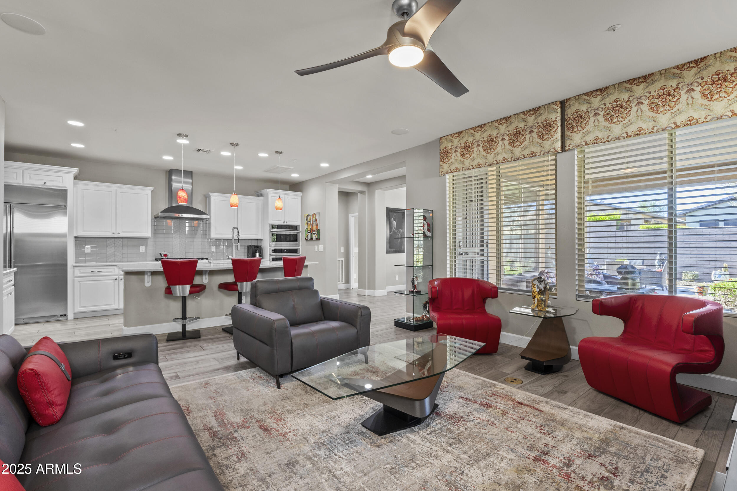 18068 East Curva De Plata Rio Verde, AZ 85263 - Photo 27 of 71 a living room with furniture and a large window