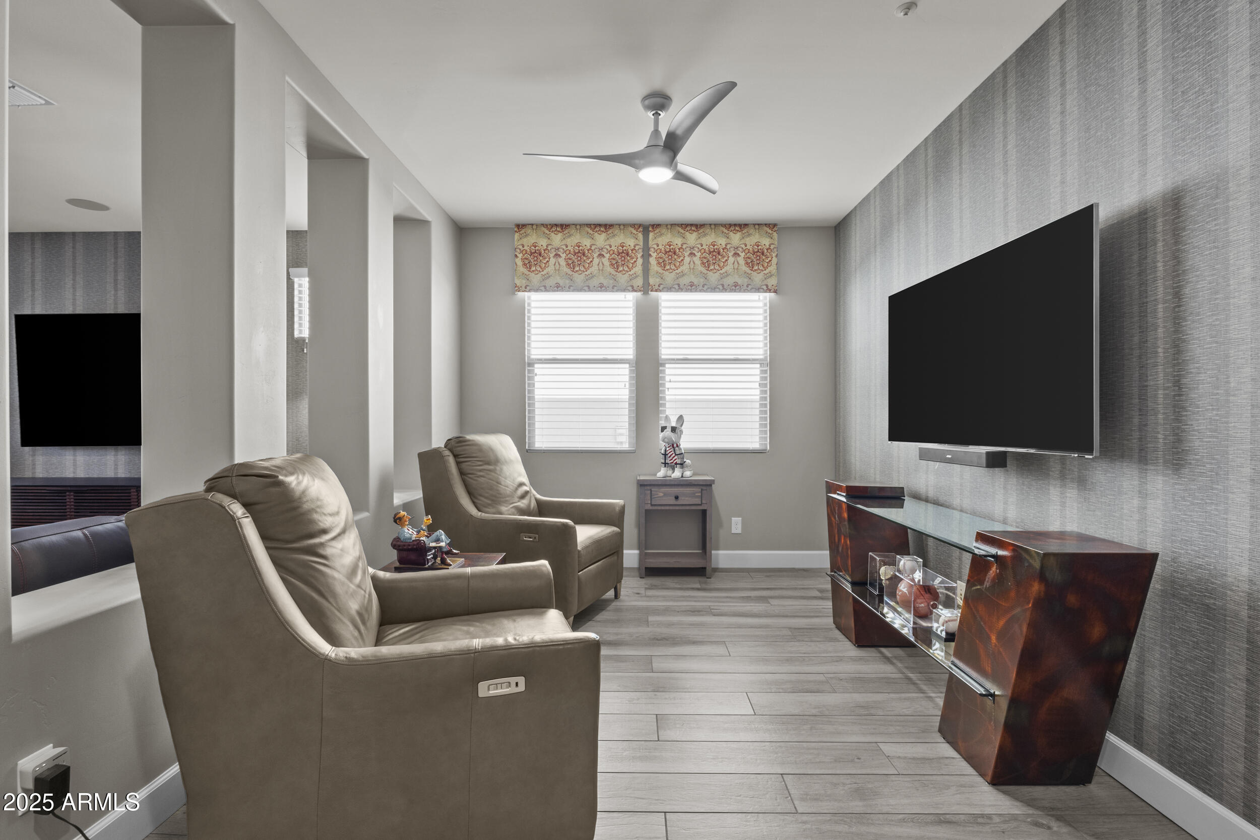 18068 East Curva De Plata Rio Verde, AZ 85263 - Photo 29 of 71 a living room with furniture and a flat screen tv