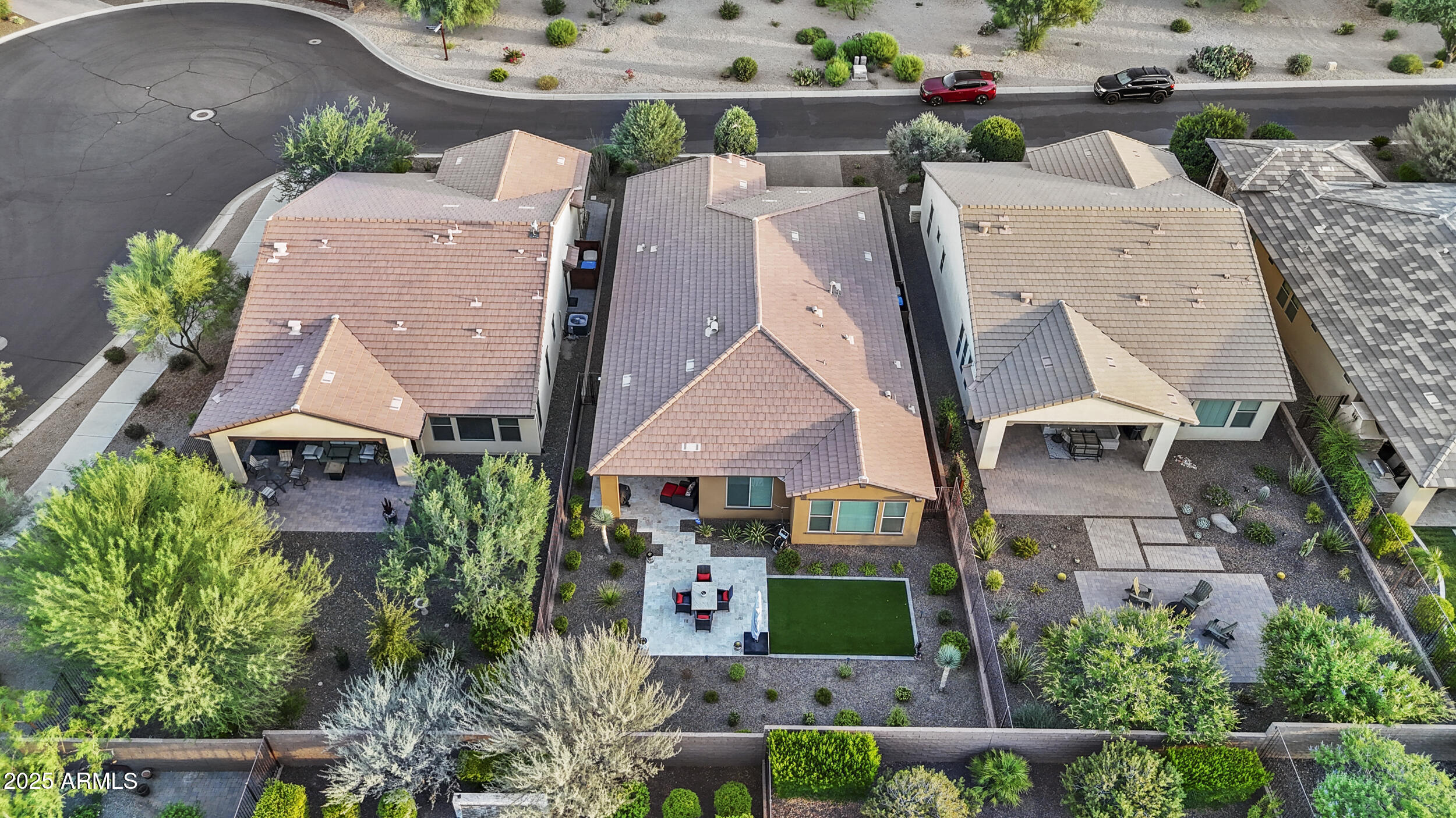 18068 East Curva De Plata Rio Verde, AZ 85263 - Photo 2 of 71 an aerial view of multiple houses with a yard