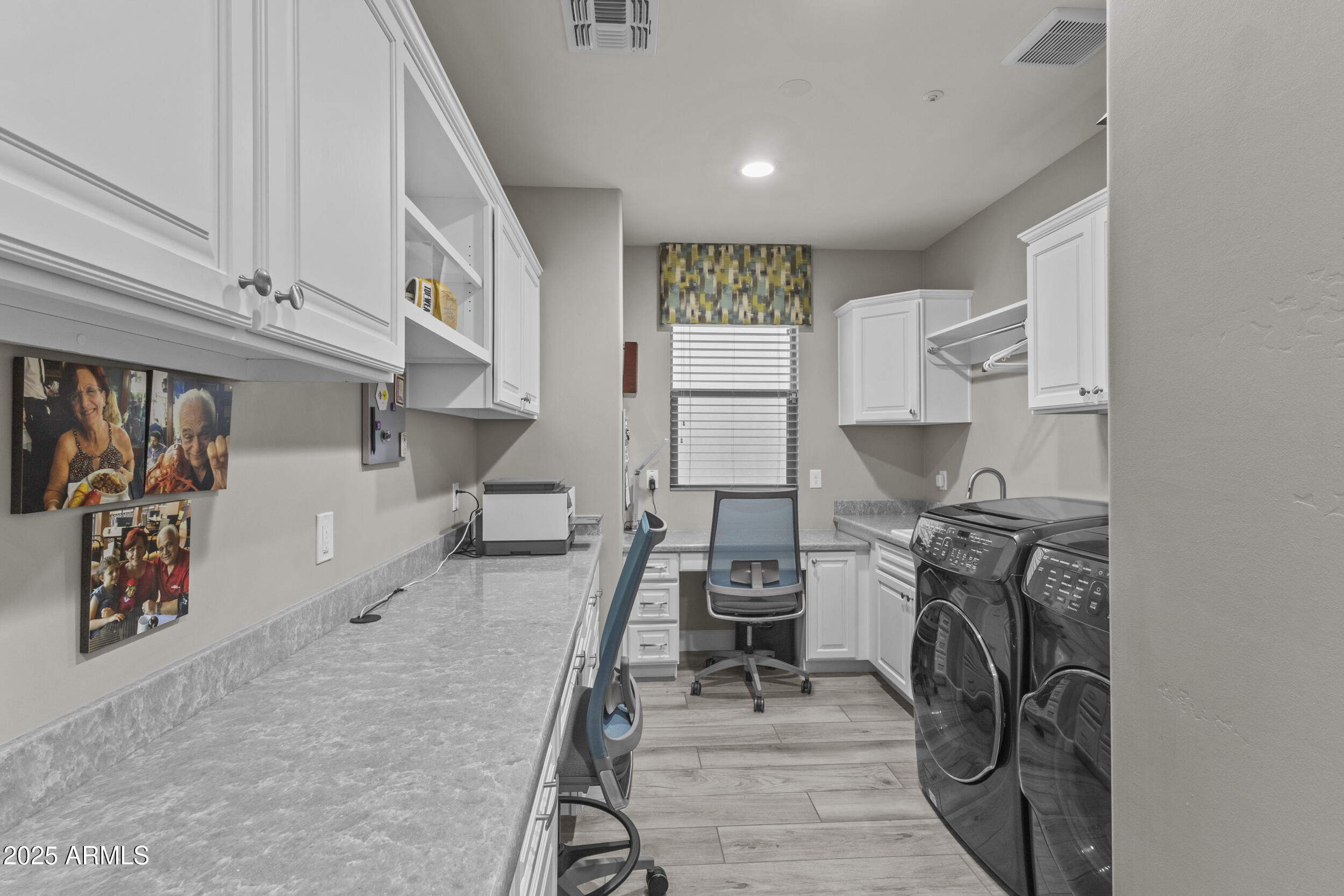 18068 East Curva De Plata Rio Verde, AZ 85263 - Photo 31 of 71 a kitchen with stainless steel appliances kitchen island granite countertop a stove and a sink