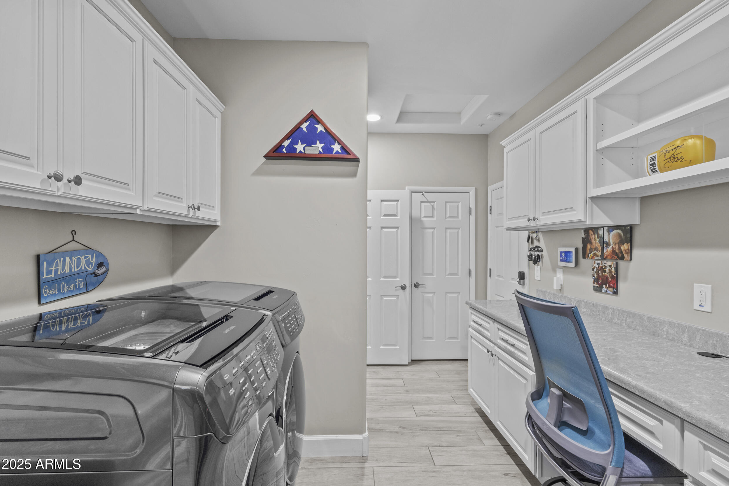 18068 East Curva De Plata Rio Verde, AZ 85263 - Photo 32 of 71 a bedroom with a bed and wooden floor