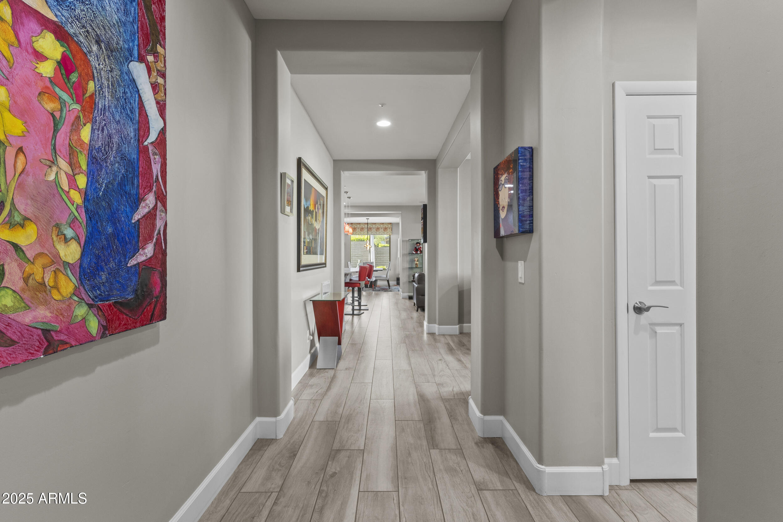 18068 East Curva De Plata Rio Verde, AZ 85263 - Photo 34 of 71 a view of a hallway with wooden floor and staircase