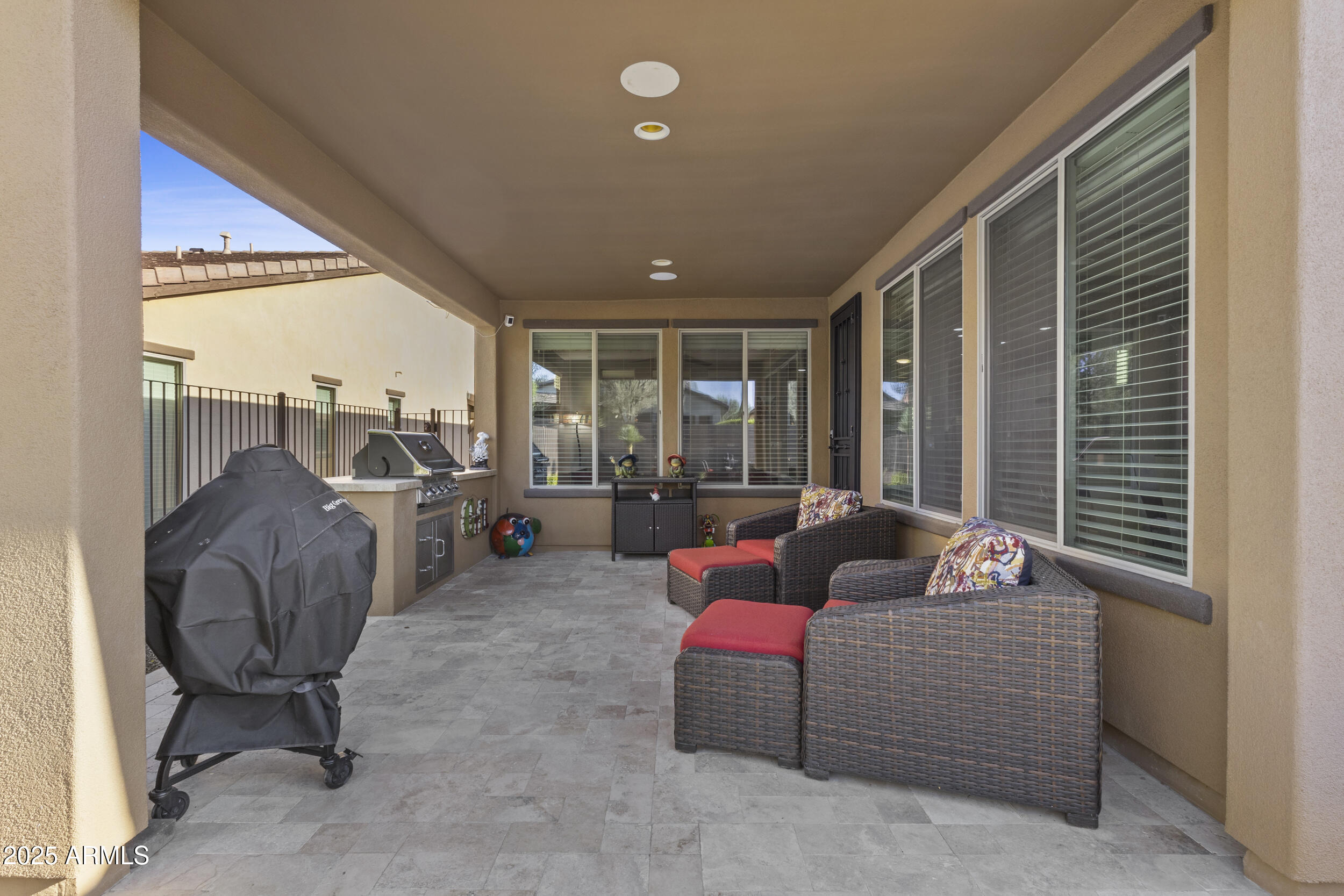 18068 East Curva De Plata Rio Verde, AZ 85263 - Photo 38 of 71 a living room with furniture and a large window