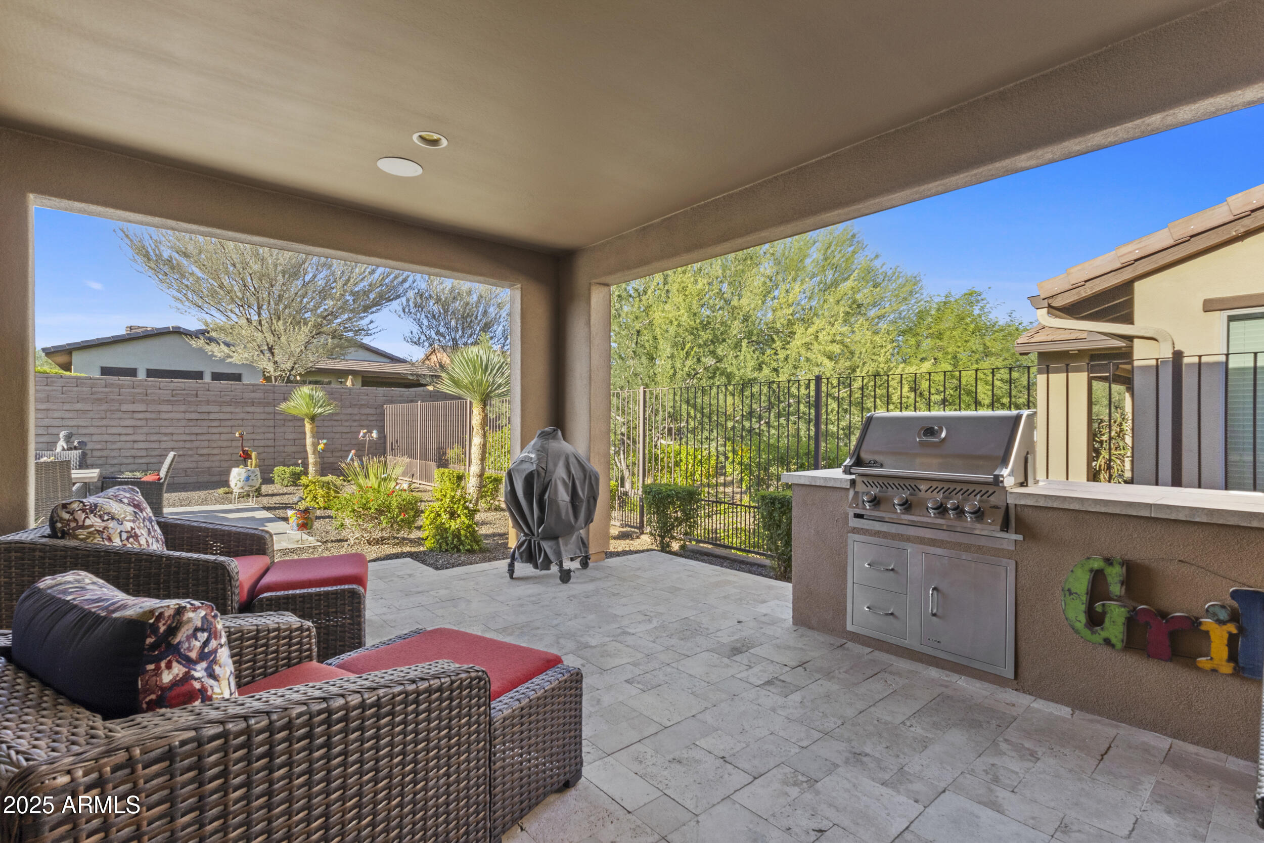18068 East Curva De Plata Rio Verde, AZ 85263 - Photo 39 of 71 a room with furniture and a large window