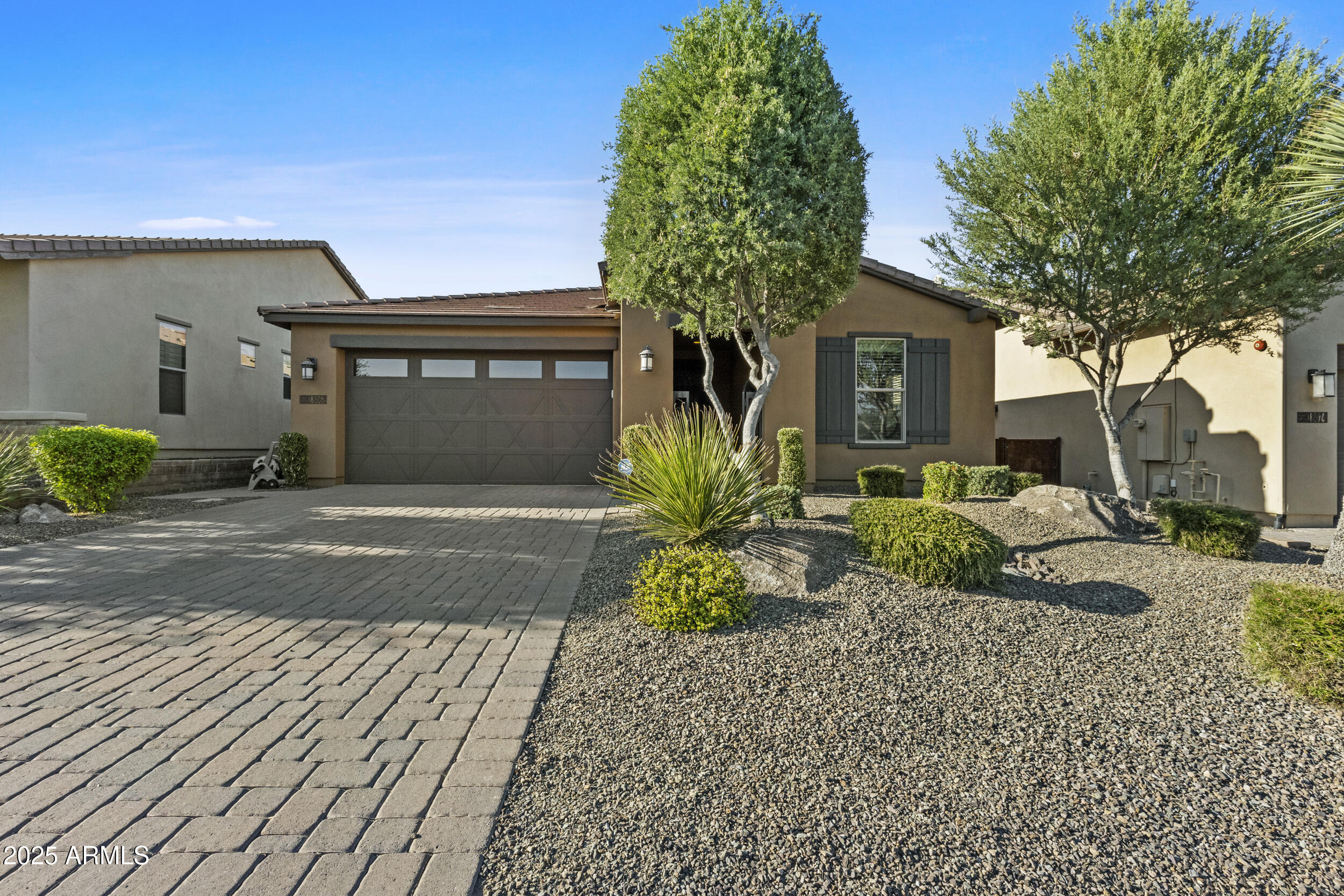 18068 East Curva De Plata Rio Verde, AZ 85263 - Photo 3 of 71 a front view of a house with a yard