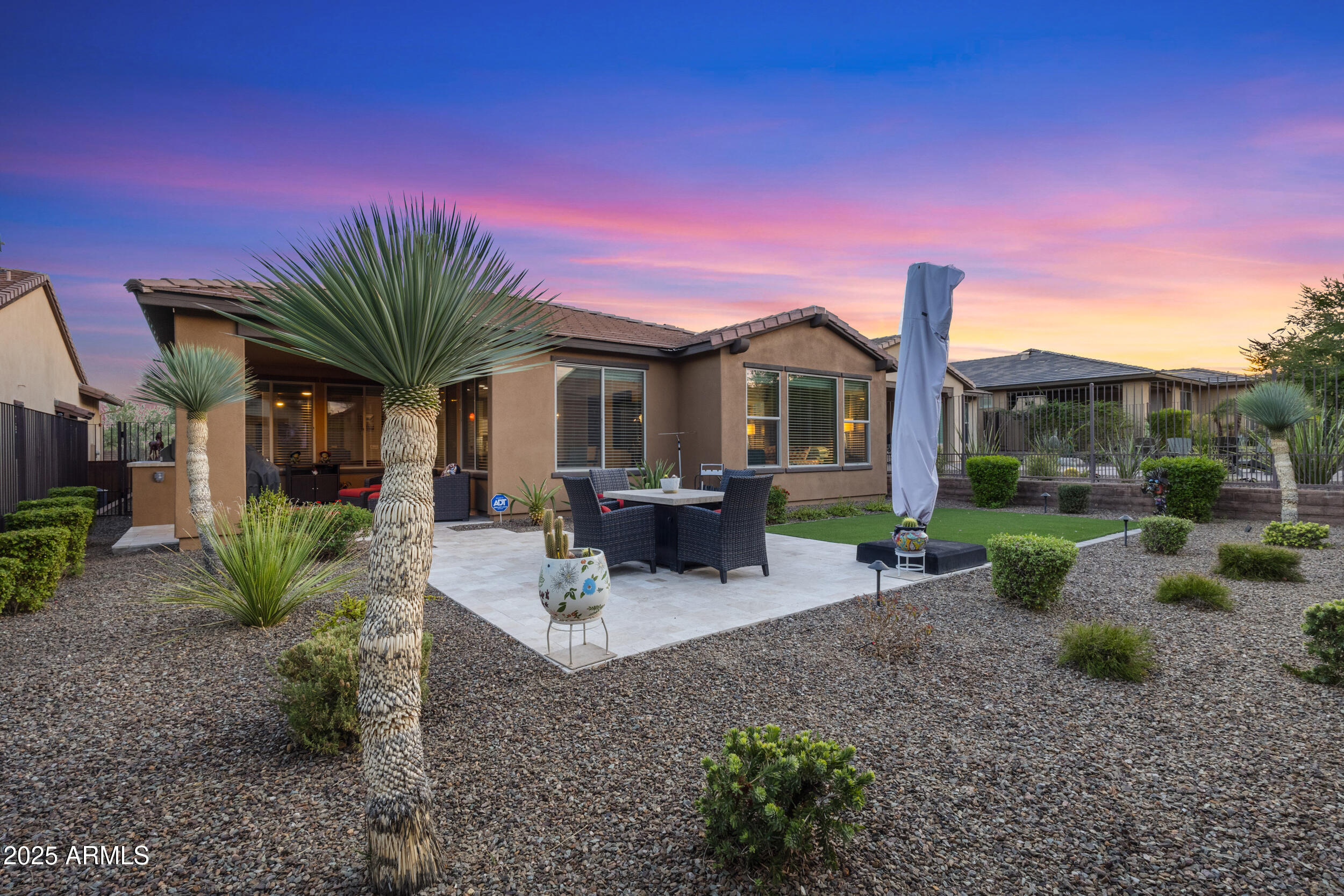 18068 East Curva De Plata Rio Verde, AZ 85263 - Photo 44 of 71 a front view of a house with garden and sitting area