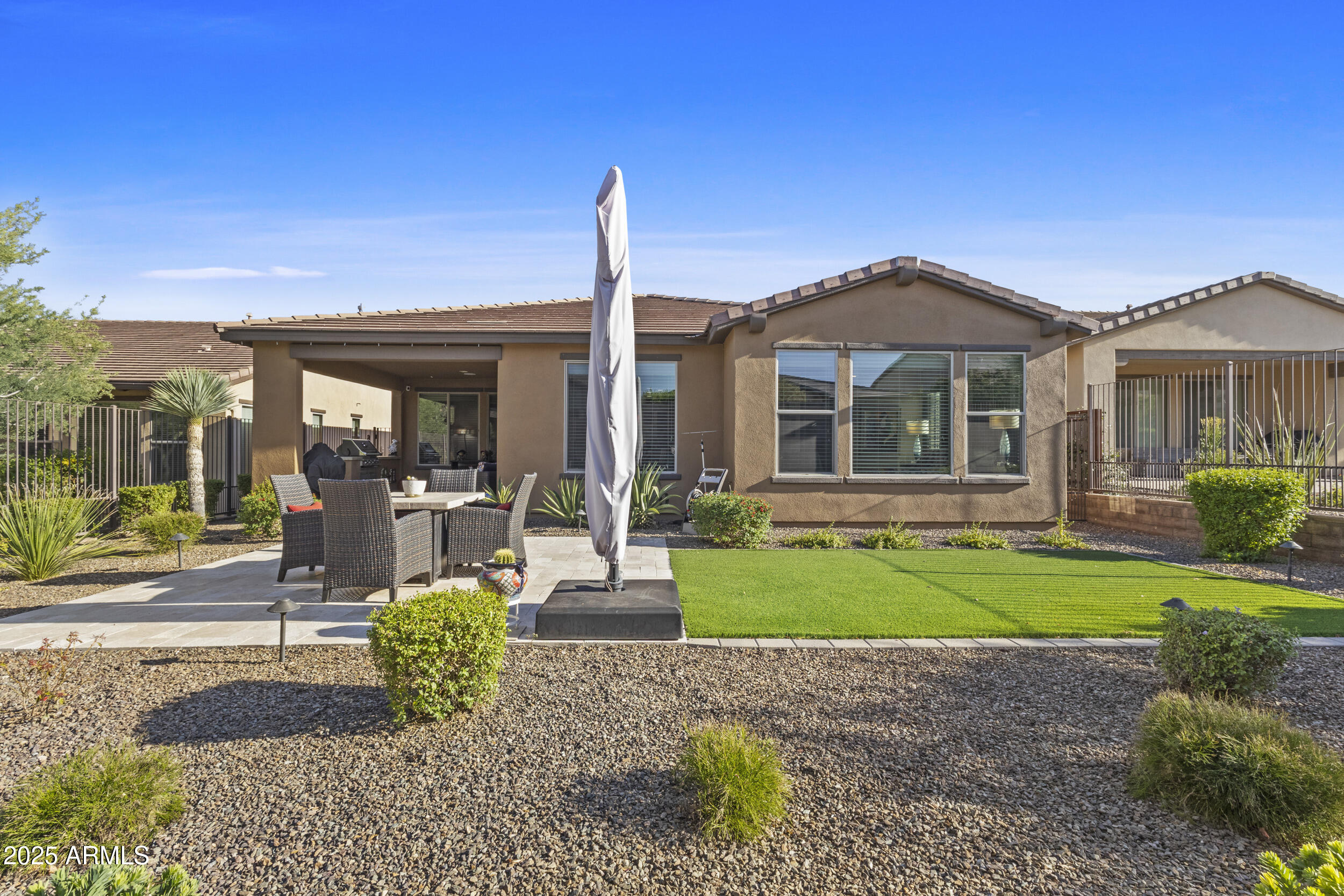 18068 East Curva De Plata Rio Verde, AZ 85263 - Photo 45 of 71 a front view of a house with garden
