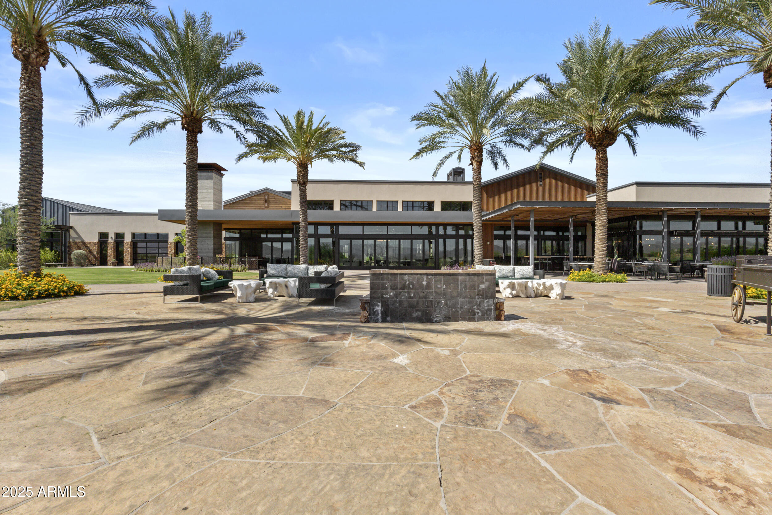 18068 East Curva De Plata Rio Verde, AZ 85263 - Photo 58 of 71 a view of a swimming pool with a patio and palm tree