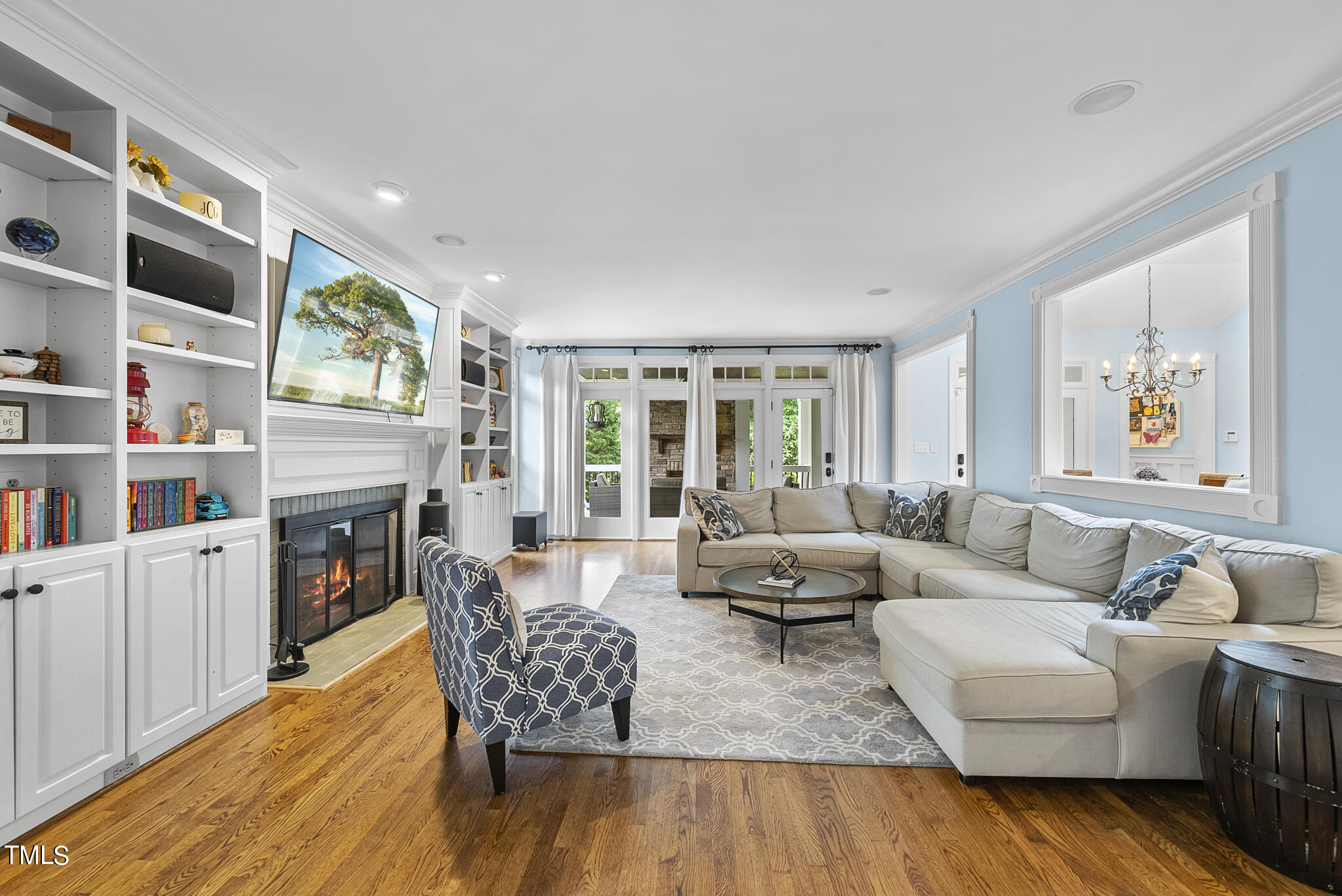 513 Lake Boone Trail Raleigh, NC 27608 - Photo 11 of 41 a living room with fireplace furniture and a wooden floor