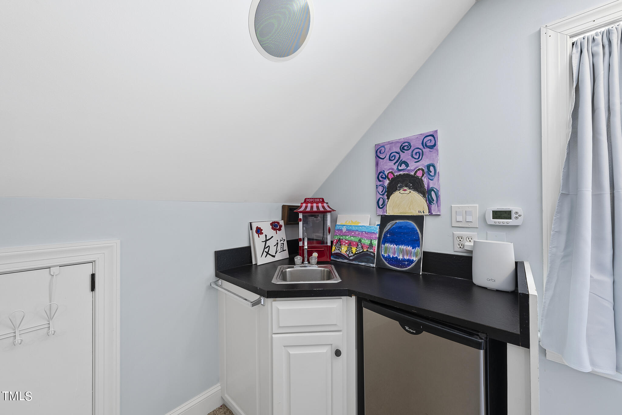 513 Lake Boone Trail Raleigh, NC 27608 - Photo 29 of 41 a kitchen with a sink cabinets and window