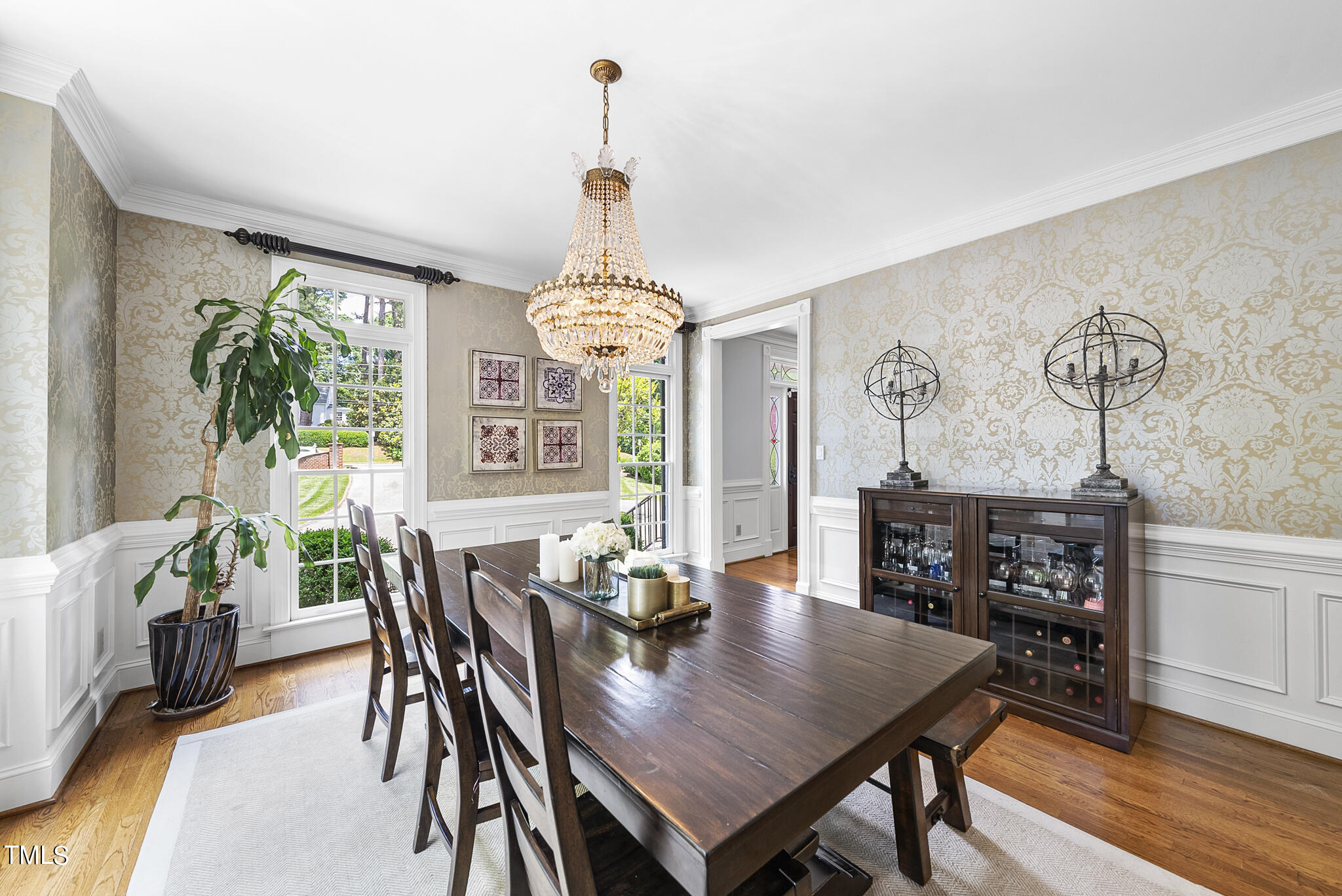 513 Lake Boone Trail Raleigh, NC 27608 - Photo 3 of 41 a view of a dining room with furniture window and wooden floor
