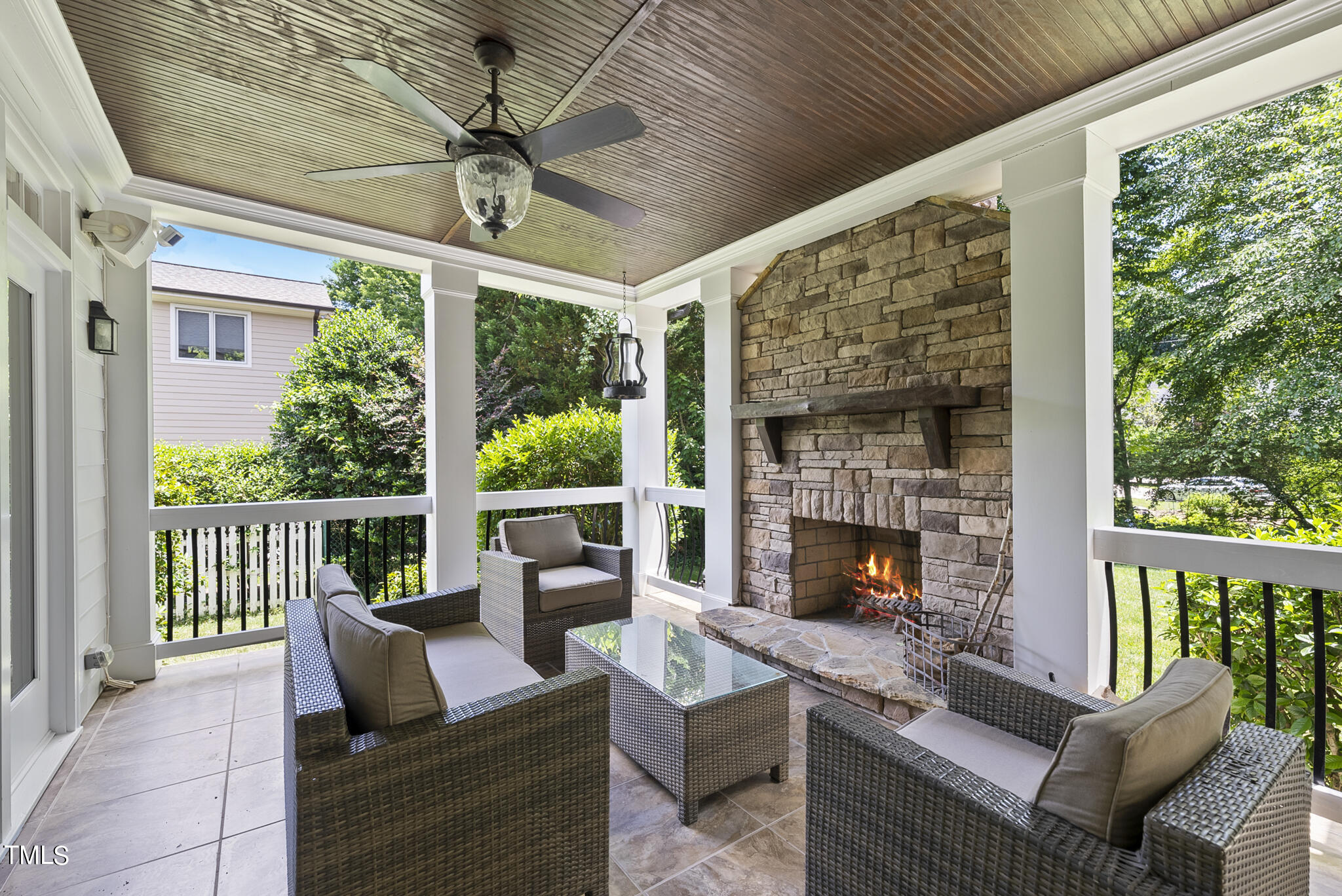 513 Lake Boone Trail Raleigh, NC 27608 - Photo 31 of 41 a outdoor space with patio fireplace and a potted plant