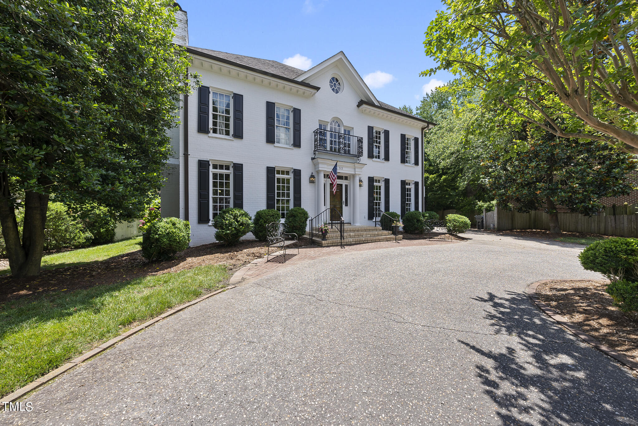 513 Lake Boone Trail Raleigh, NC 27608 - Photo 35 of 41 a front view of a house with a yard and a garage