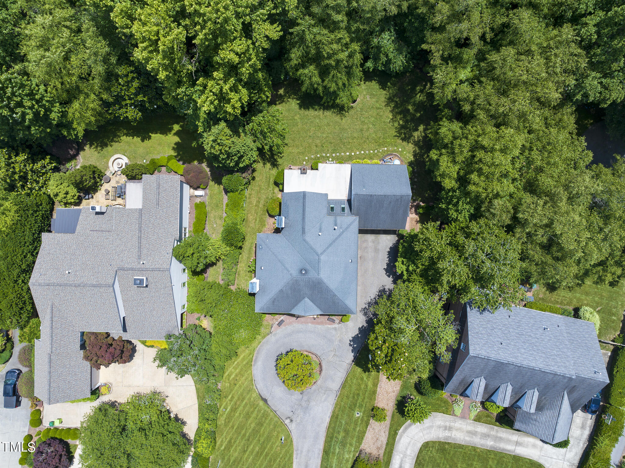 513 Lake Boone Trail Raleigh, NC 27608 - Photo 38 of 41 an aerial view of a house with outdoor space and trees all around