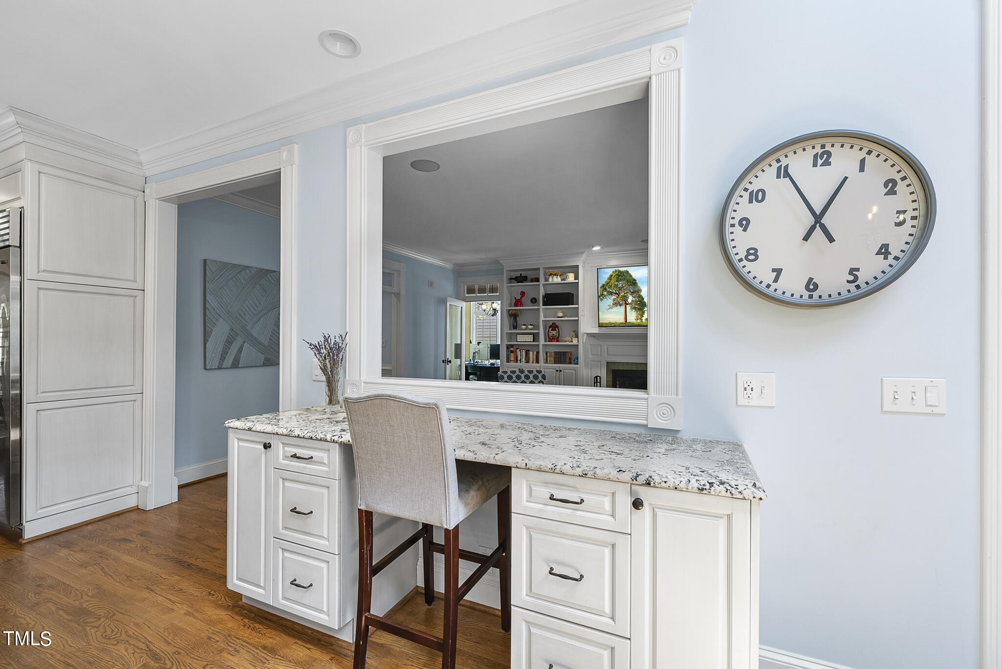 513 Lake Boone Trail Raleigh, NC 27608 - Photo 8 of 41 a view with a table and a clock on wall