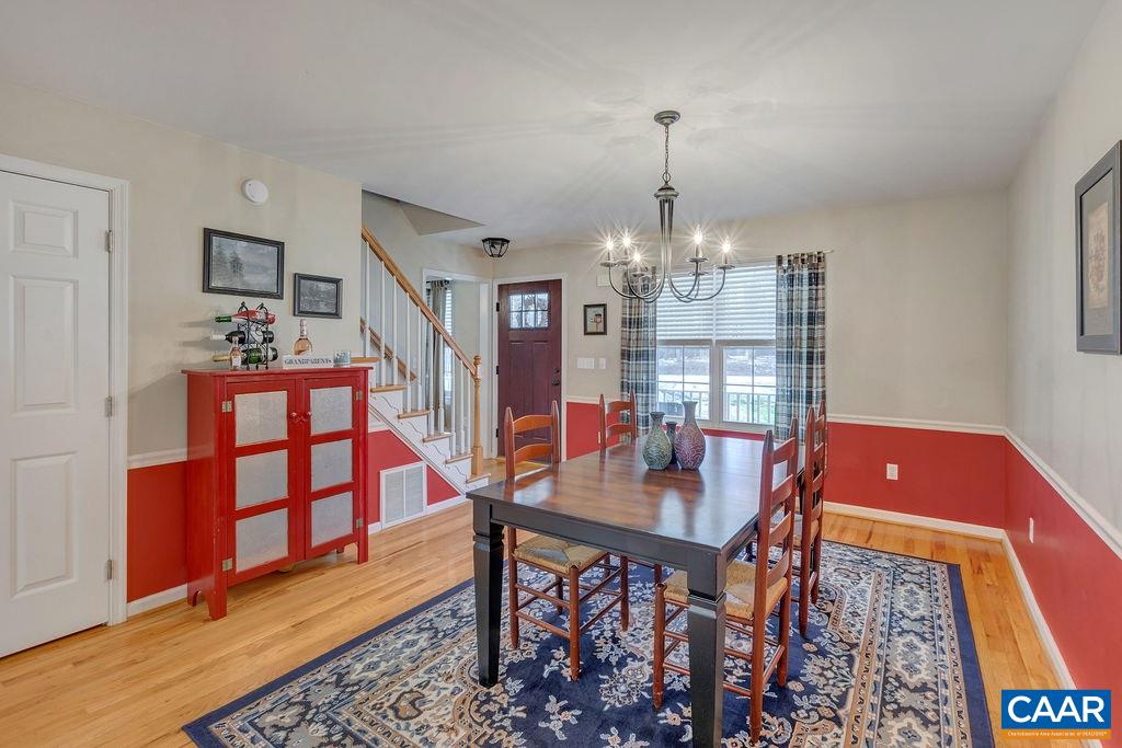 13 Stonewall Road Palmyra, VA 22963 - Photo 15 of 45 a view of a dining room with furniture and chandelier