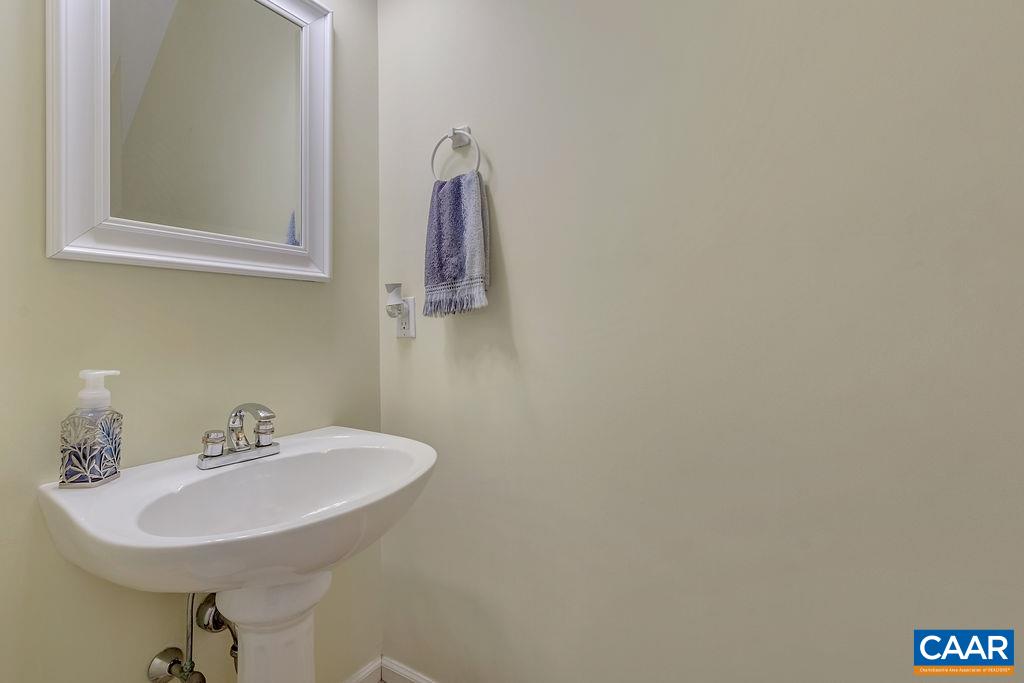 13 Stonewall Road Palmyra, VA 22963 - Photo 18 of 45 a bathroom with a sink and a mirror