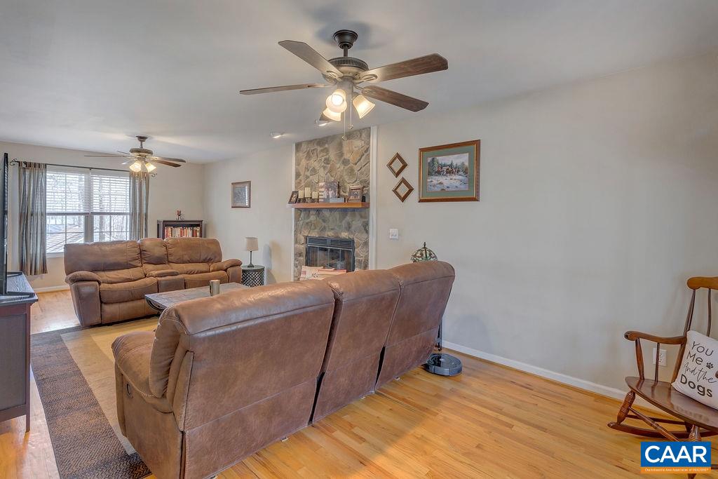13 Stonewall Road Palmyra, VA 22963 - Photo 7 of 45 a living room with furniture and a ceiling fan