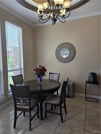 a kitchen with stainless steel appliances granite countertop a stove a sink a refrigerator and a microwave