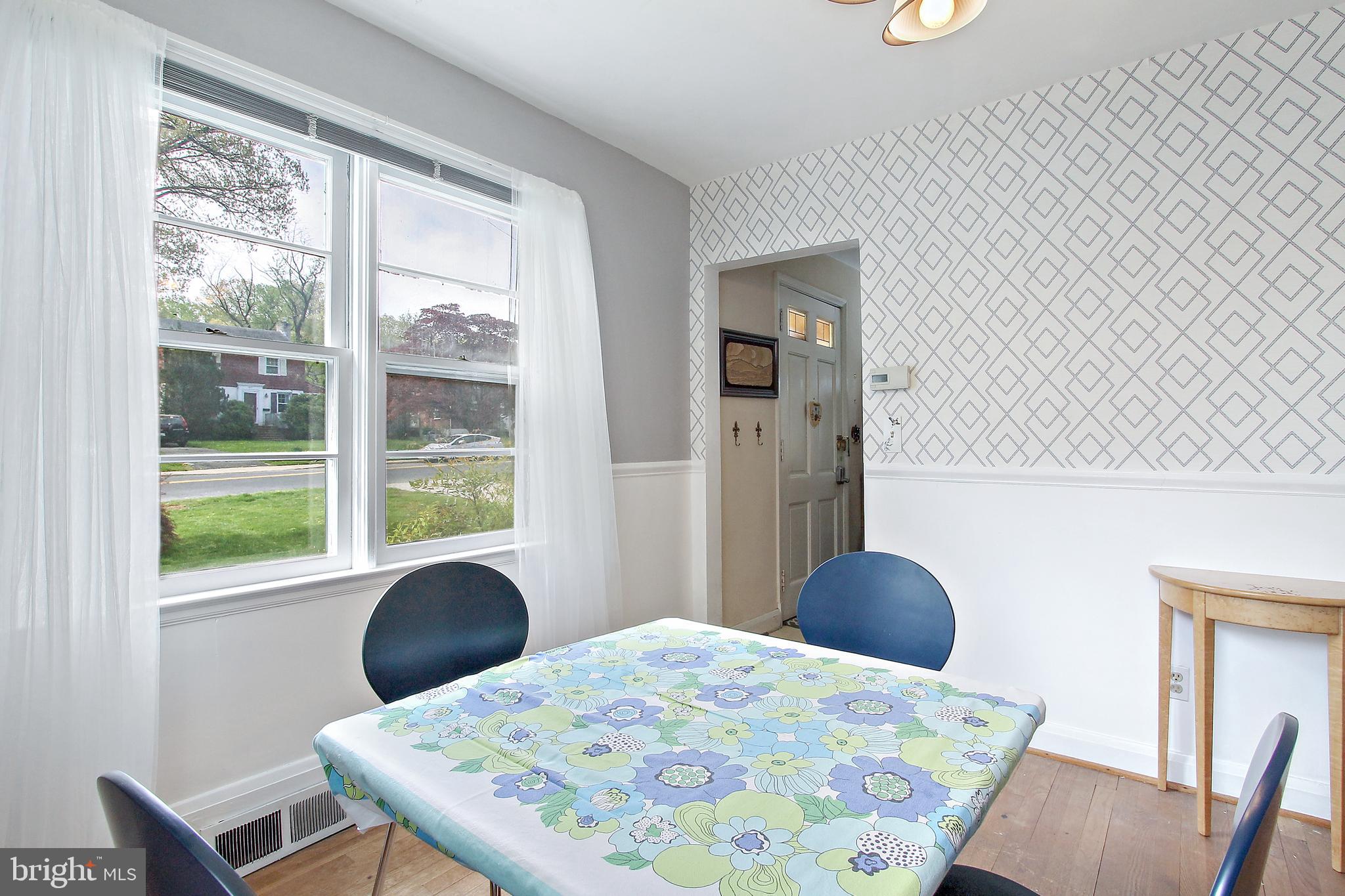416 Milford Mill Road Baltimore, MD 21208 - Photo 11 of 24 Separate dining room with fantastic natural light