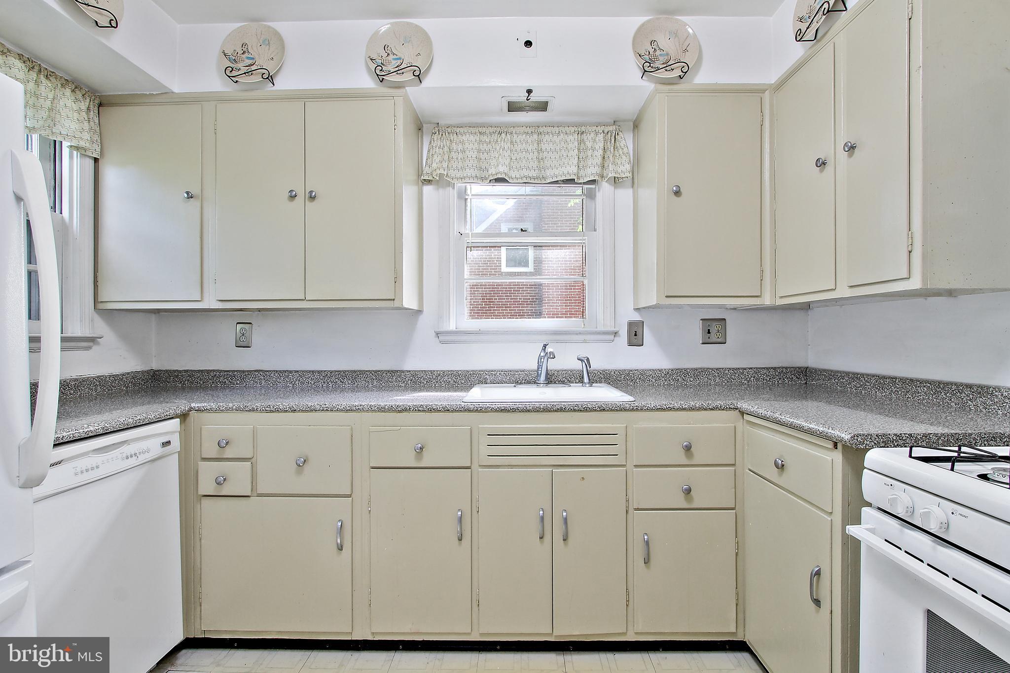 416 Milford Mill Road Baltimore, MD 21208 - Photo 12 of 24 Tons of counter space in the kitchen!