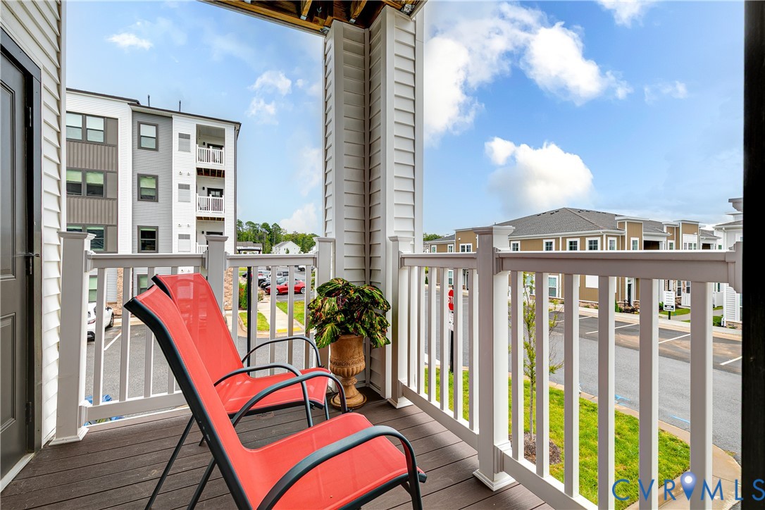 3900 Maze Runner Drive, Unit 206 Midlothian, VA 23112 - Photo 24 of 26 a view of a balcony with furniture