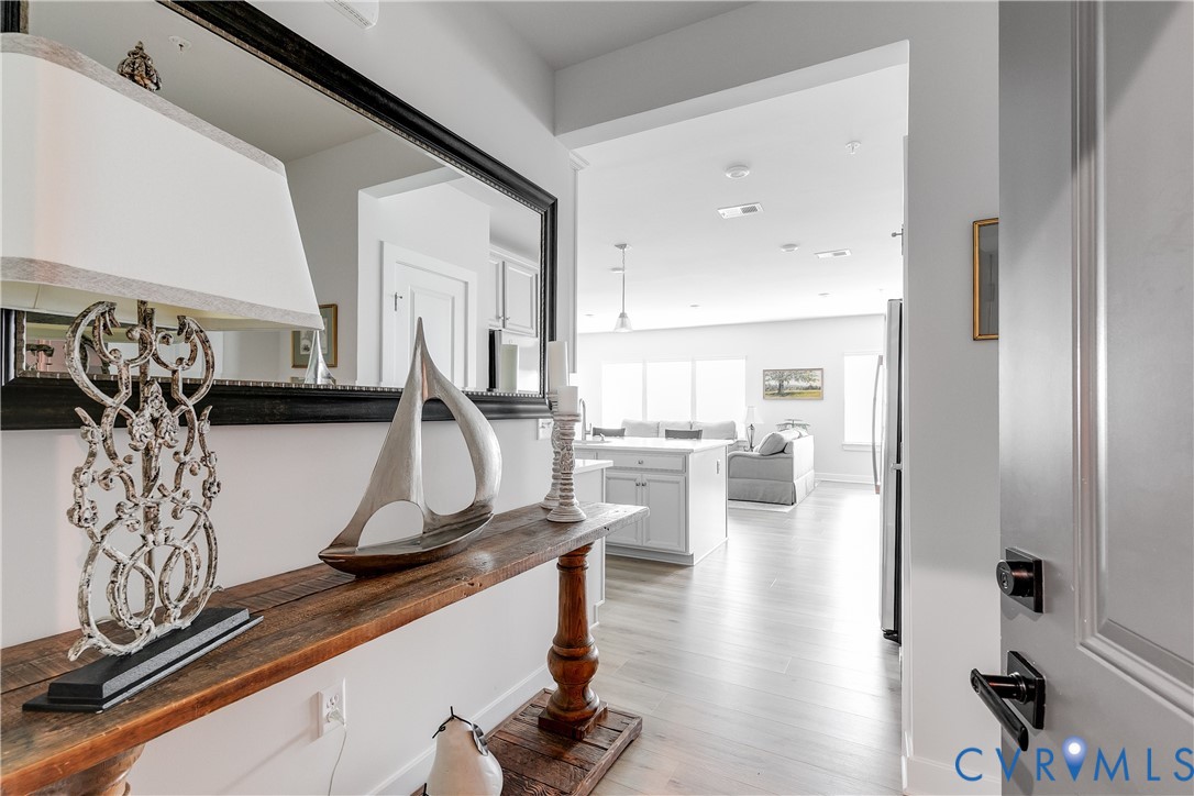 3900 Maze Runner Drive, Unit 206 Midlothian, VA 23112 - Photo 6 of 26 a view of living room with furniture and wooden floor